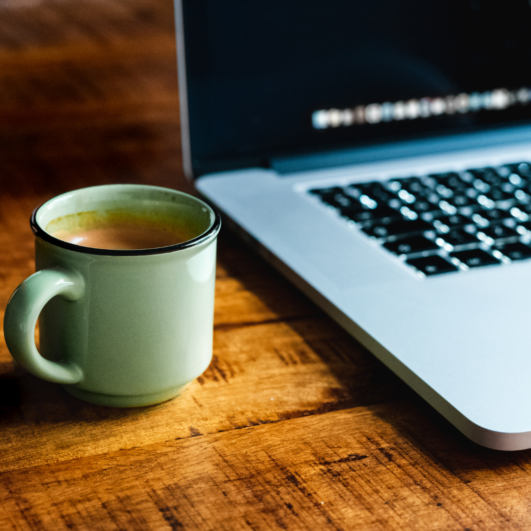 Laptop and cup of coffee